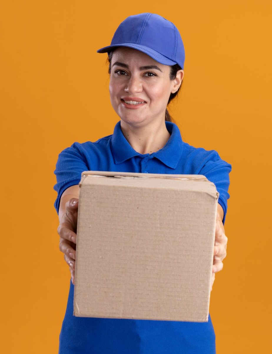 https://newcablojistik.com/wp-content/uploads/2023/07/smiling-young-delivery-woman-uniform-cap-with-cardboard-box-1.jpg